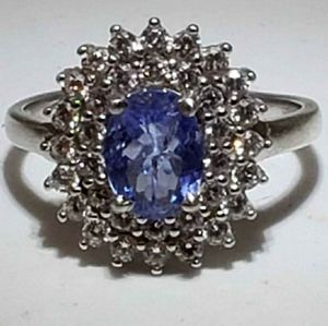 Natural tanzanite and simulated diamond ring.